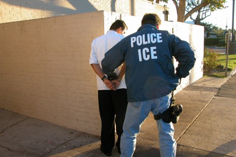 ice officer making an arrest resized 600