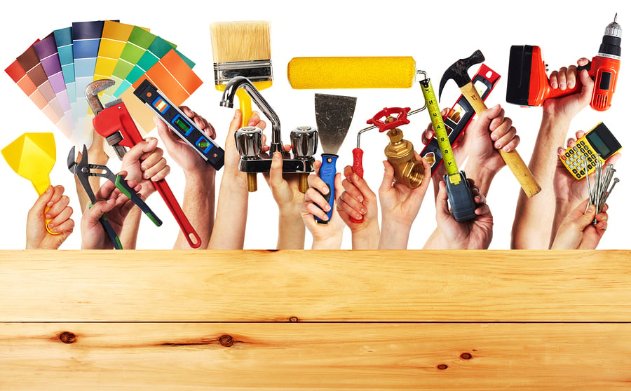 bigstock-Hands-with-construction-tools--66023965