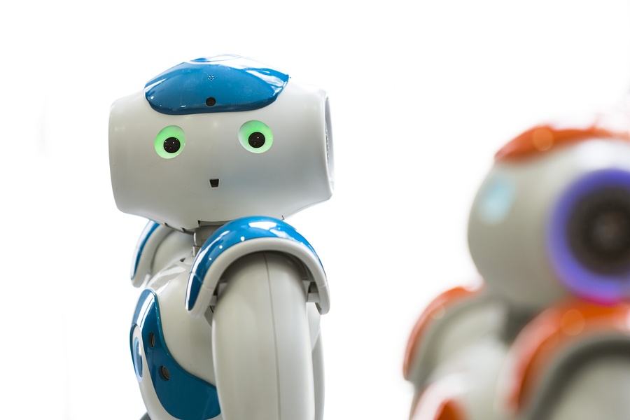 bigstock-Small-Robots-With-Human-Face-A-145228328.jpg
